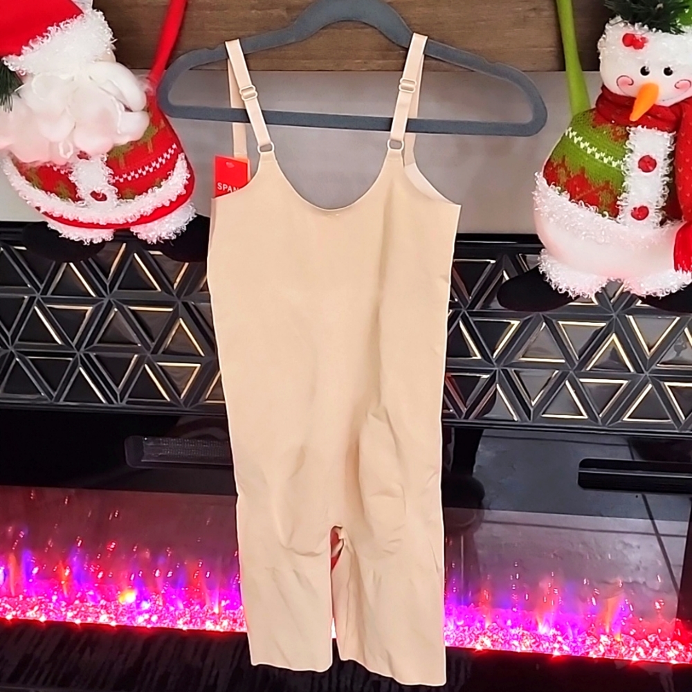 Bodysuit brand new spanx nude color. Size small
